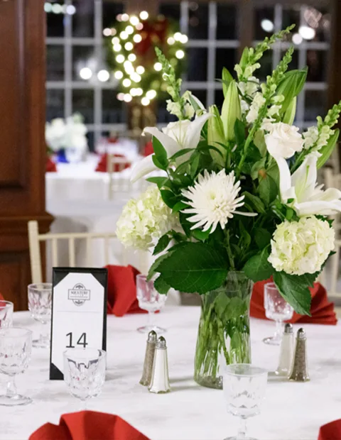 Floral arrangement on table in the Wagon Room