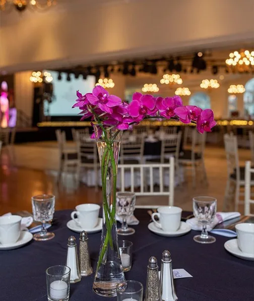 Floral arrangement on table at a corporate event