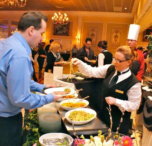 Covered foods on a buffet table