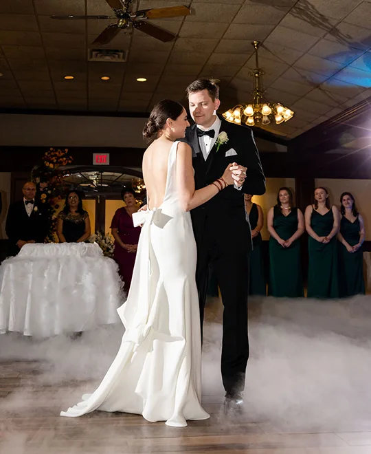 Bride and groom dancing during their wedding reception