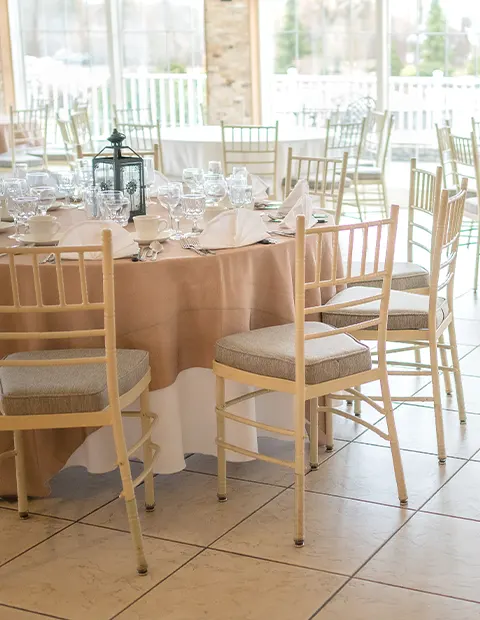 Table set up around dance floor in The Glass Room