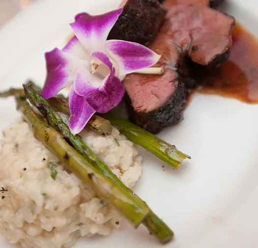 Steak, potatoes, and asparagus dinner plate
