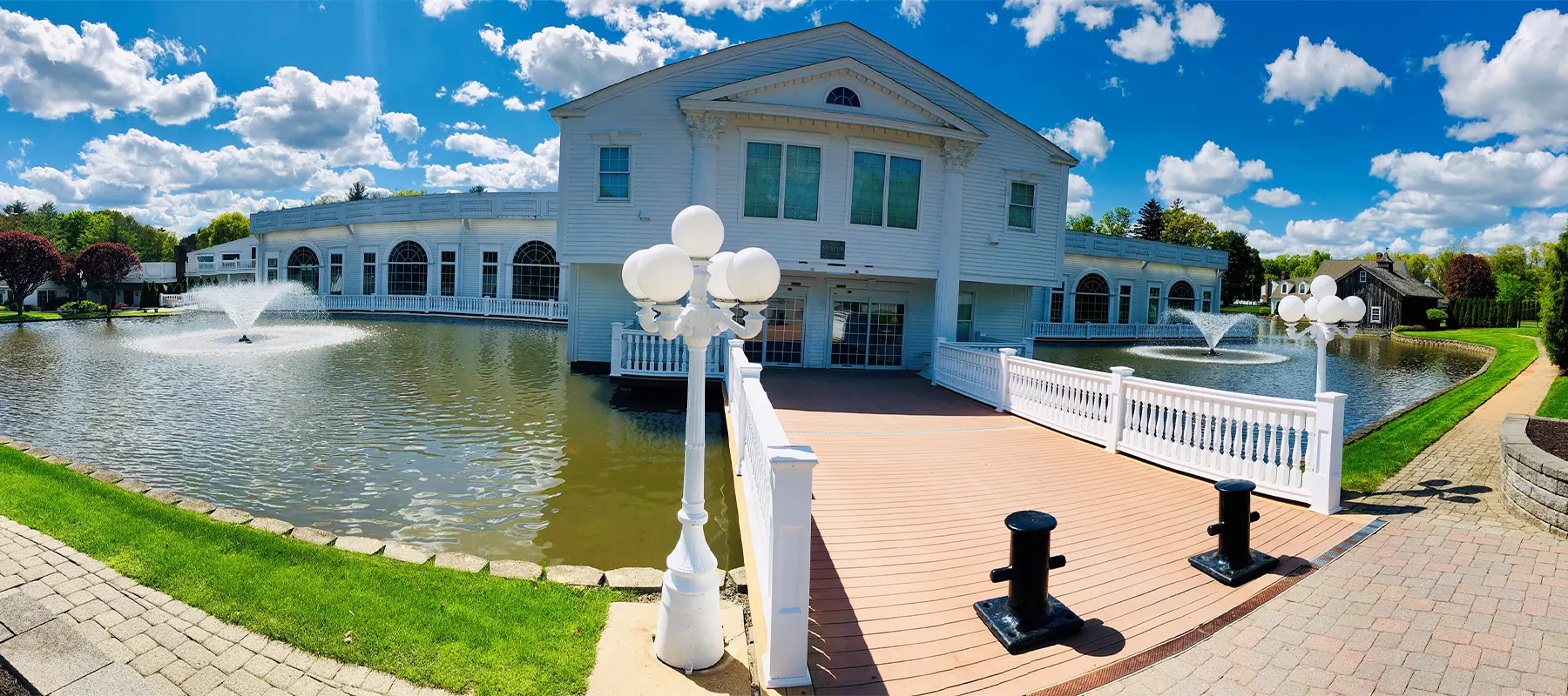 Pond and landscaping outside Aqua Turf Club