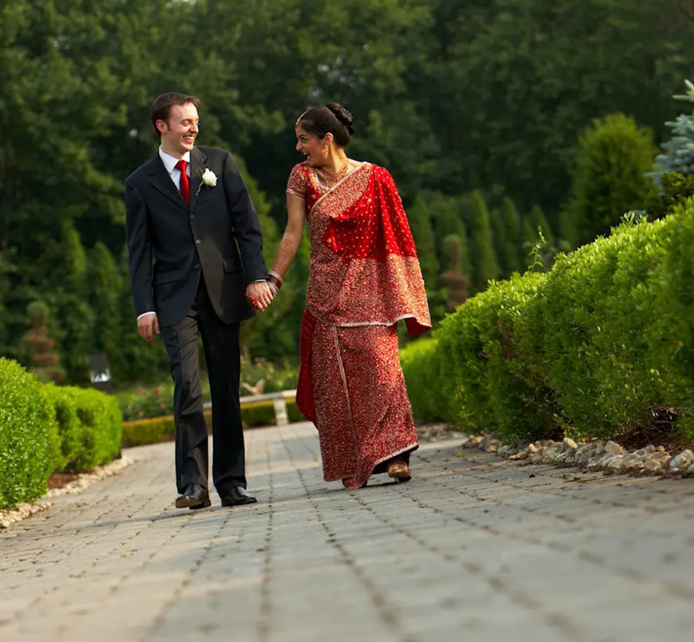 Bride and groom holding hands